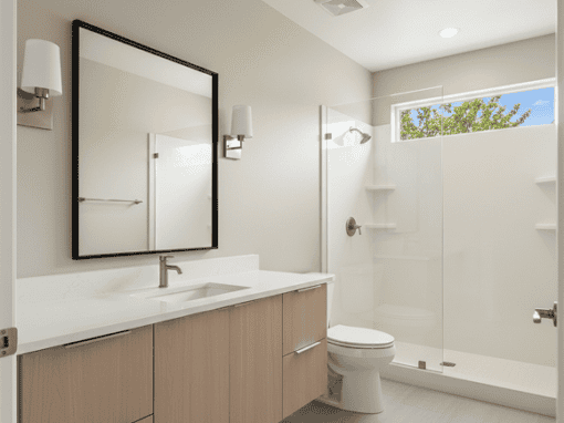 Bright modern bathroom with walk-in shower, vanity, and natural light.