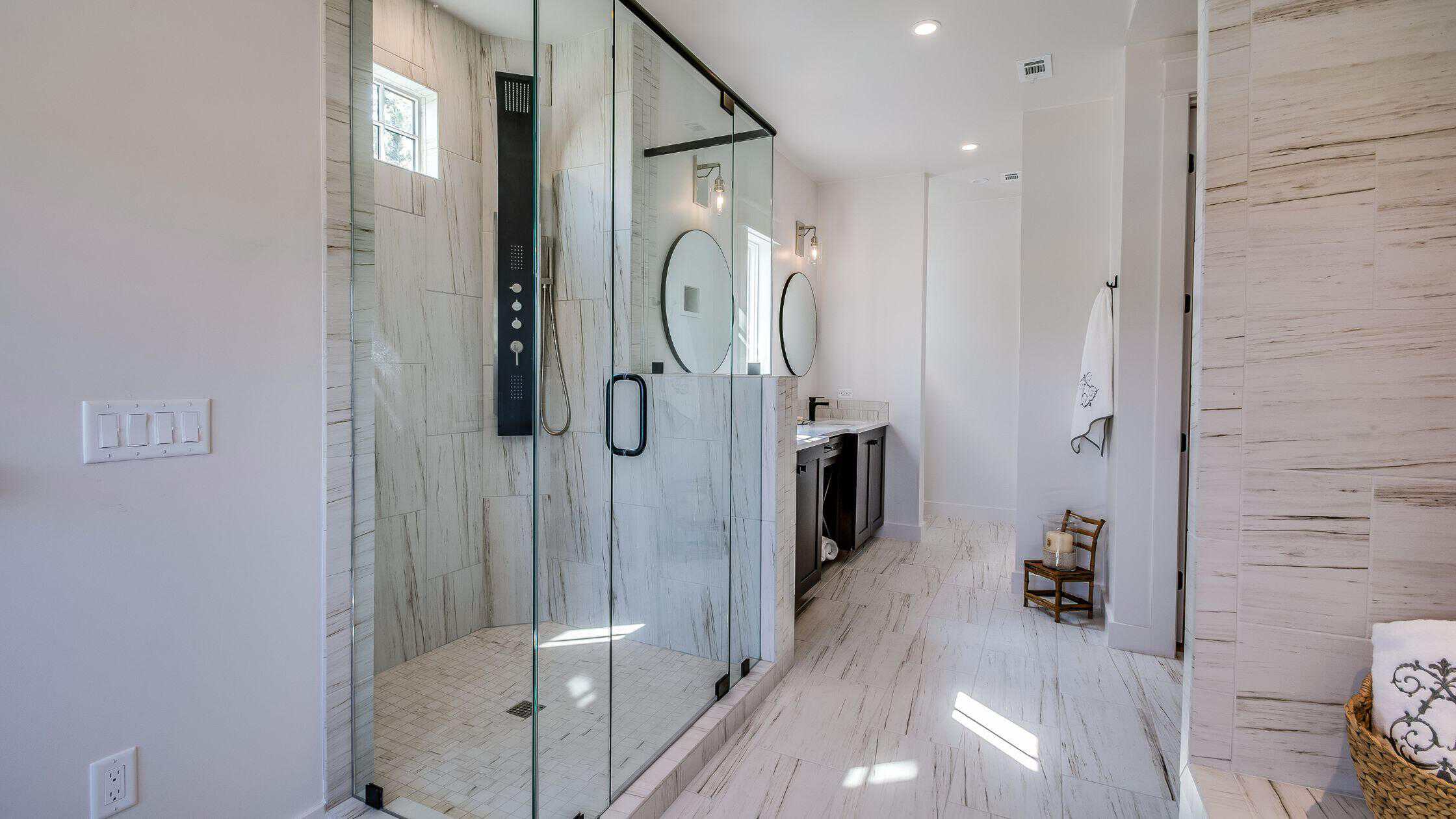 Modern Bathroom Shower Luxury walk-in shower with glass enclosure and sleek fixtures.