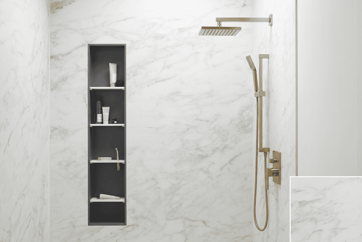 Modern walk-in shower with gold fixtures and marble walls at Blue Mountain Bathrooms.